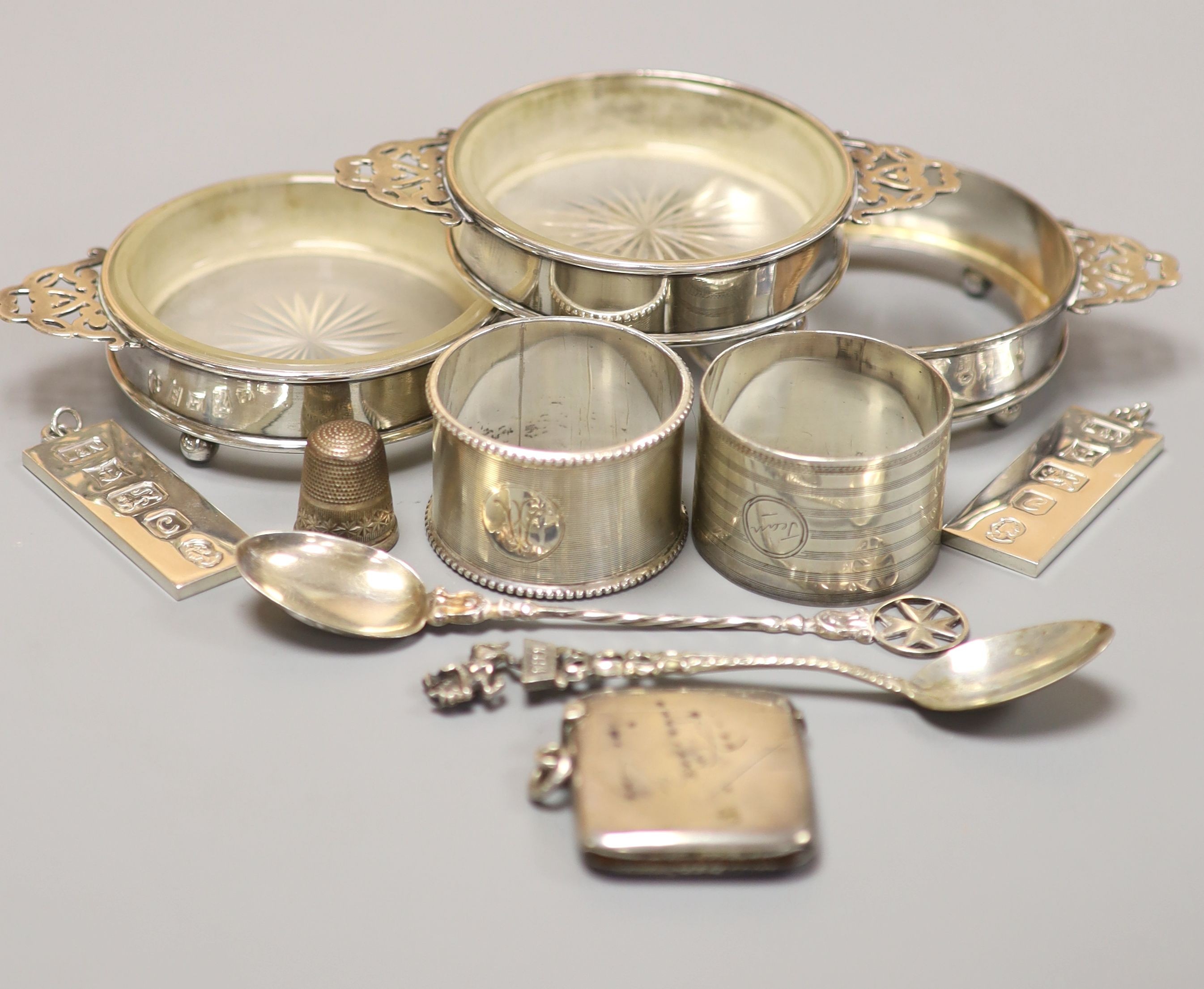 Small silver including three butter dishes, vesta case, two napkin rings etc.